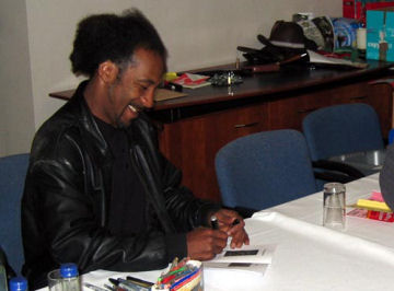 Danny signing autographs